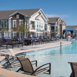 courtyard with a swimming pool and lounge chairs