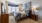 a bedroom with a bed and a desk