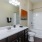 a bathroom with a tub sink and toilet